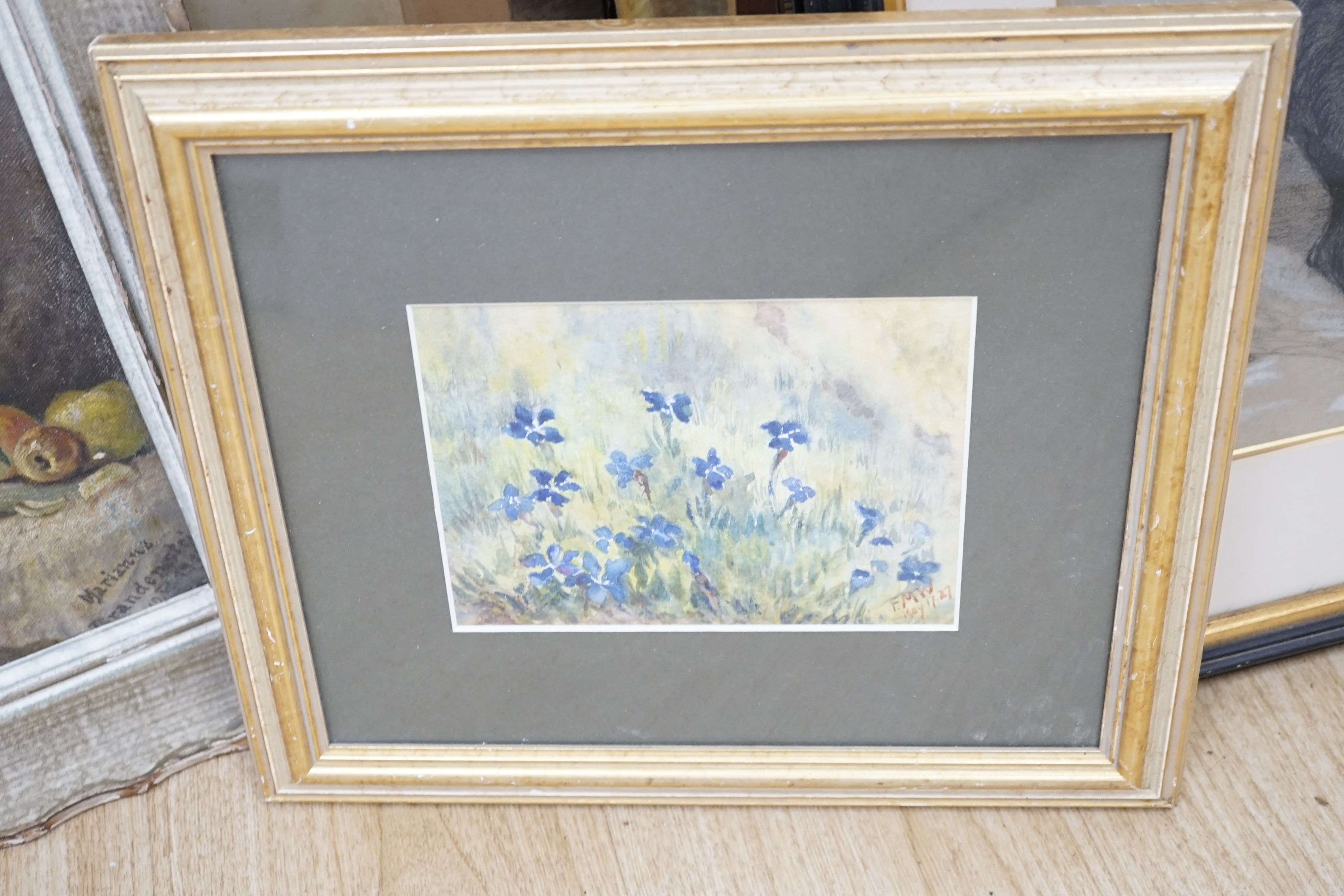 20th century, French school, oil on canvas, still life of flowers, and a watercolour of flowers, monogrammed FMW and dated ‘27, largest 32 x 23cm. Condition - fair